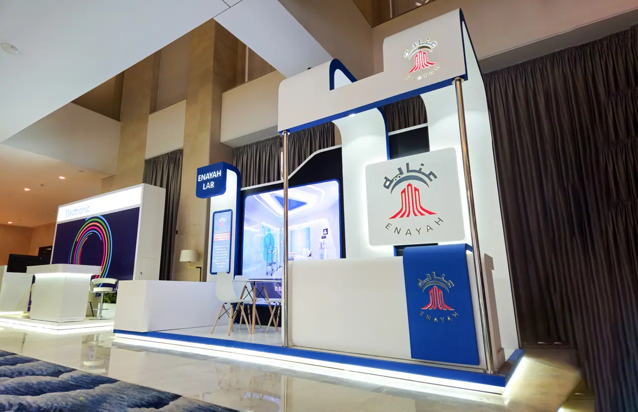 Enayah Lab — GIS Conference Stand — In the hall among neighbouring stands