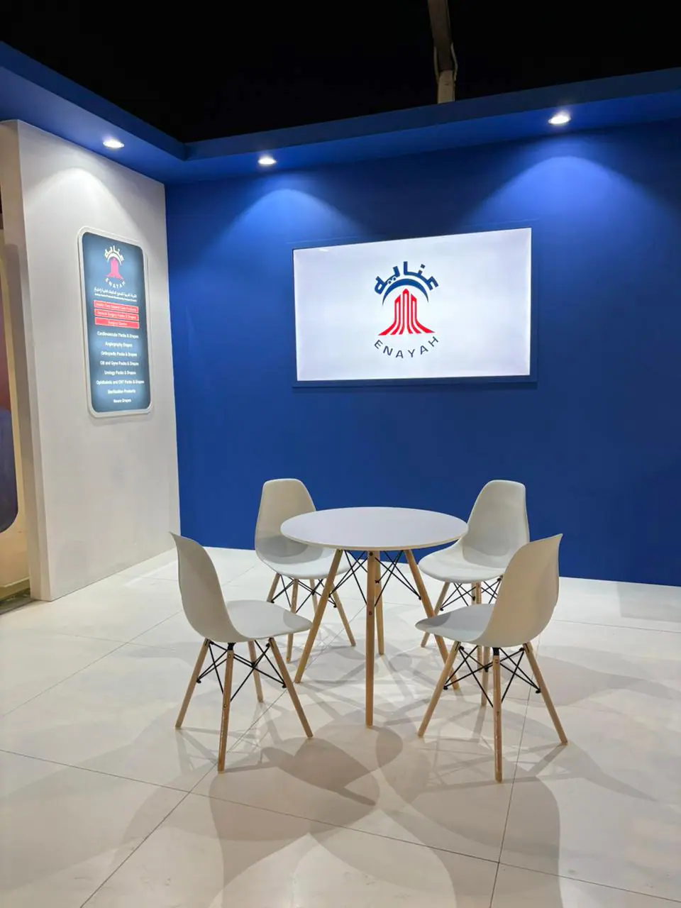 Enayah — Rural Health Conference Stand — Lounge and brand screen