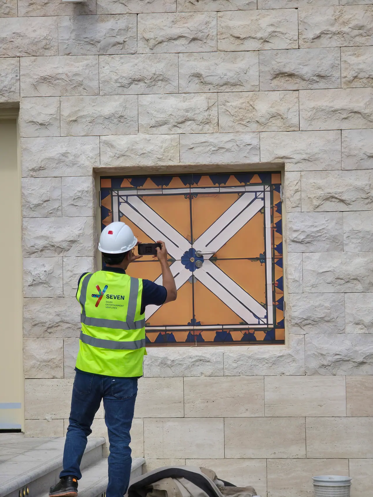Seven Abha — Destination Graphics & Wayfinding — Heritage window graphic going up