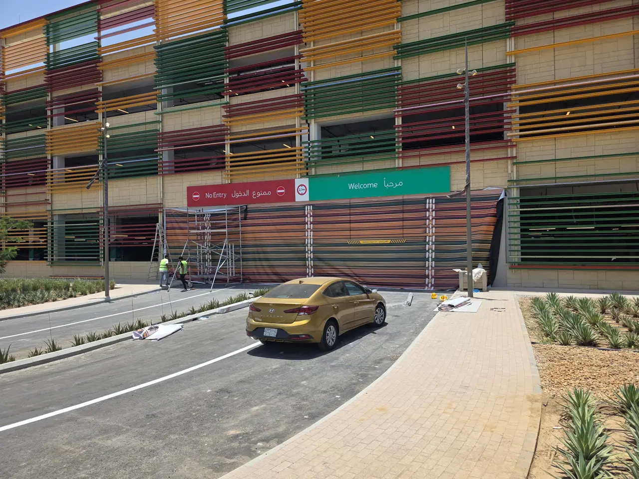 Seven Abha — Destination Graphics & Wayfinding — Car-park façade wrap and welcome signage
