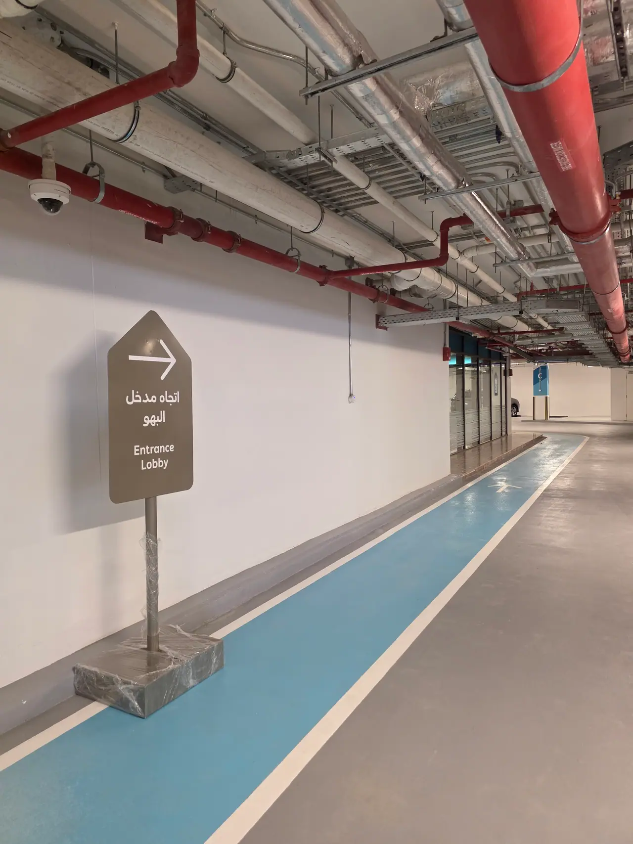 Seven Abha — Destination Graphics & Wayfinding — Directional sign in the car-park lobby